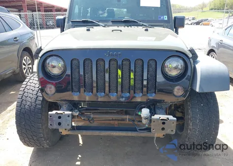 2015 Jeep Wrangler Willys Wheeler z USA, uszkodzony, nr VIN 1C4AJWAG1FL714131